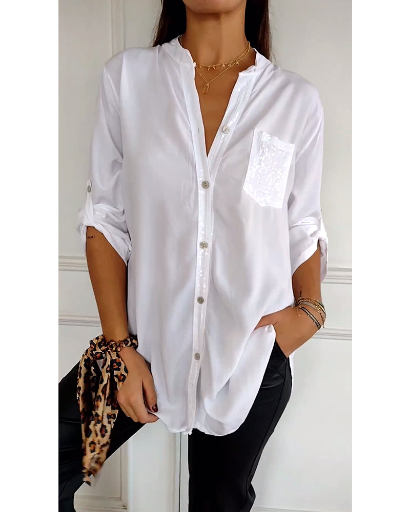 Mirla | Snygg blus med knapplist och paljettdetaljer för damer Elegant långärmad blus med paljettficka-Eva Jonsson