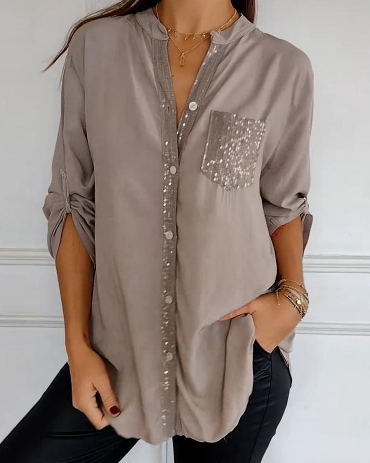 Mirla | Snygg blus med knapplist och paljettdetaljer för damer Elegant långärmad blus med paljettficka-Eva Jonsson