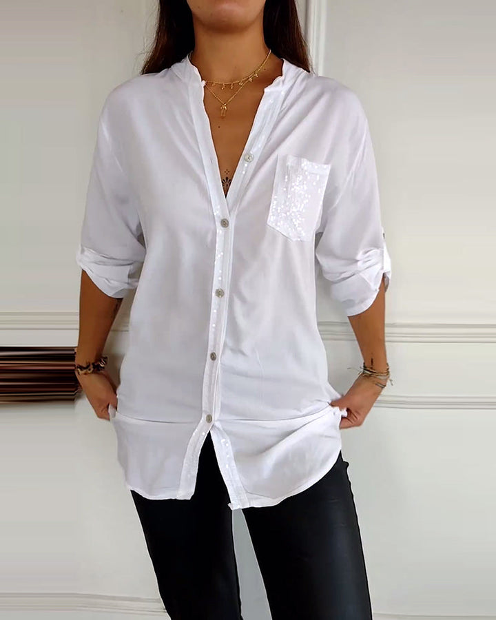 Mirla | Snygg blus med knapplist och paljettdetaljer för damer Elegant långärmad blus med paljettficka-Eva Jonsson