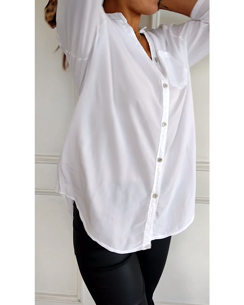 Mirla | Snygg blus med knapplist och paljettdetaljer för damer Elegant långärmad blus med paljettficka-Eva Jonsson