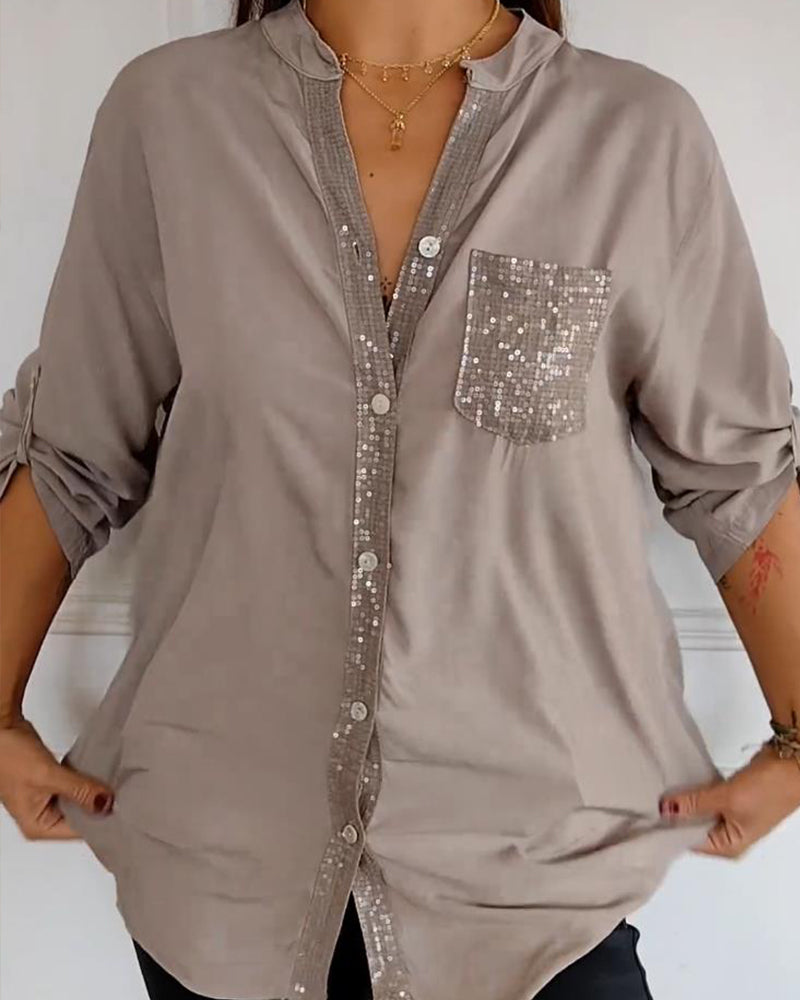 Mirla | Snygg blus med knapplist och paljettdetaljer för damer Elegant långärmad blus med paljettficka-Eva Jonsson