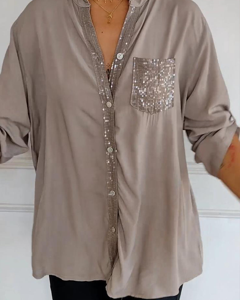 Mirla | Snygg blus med knapplist och paljettdetaljer för damer Elegant långärmad blus med paljettficka-Eva Jonsson