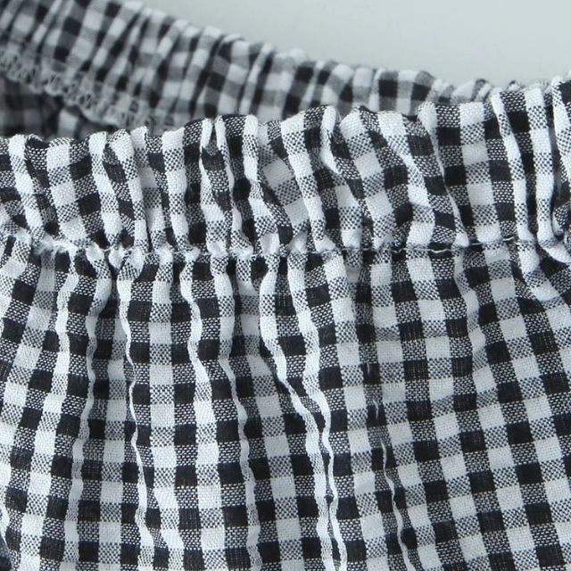 Mirla | Staplad Gingham-Midikjol med Volangdetalj-Eva Jonsson