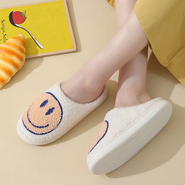 Mirla | Stort smiley-mönster pälslofflor-Eva Jonsson