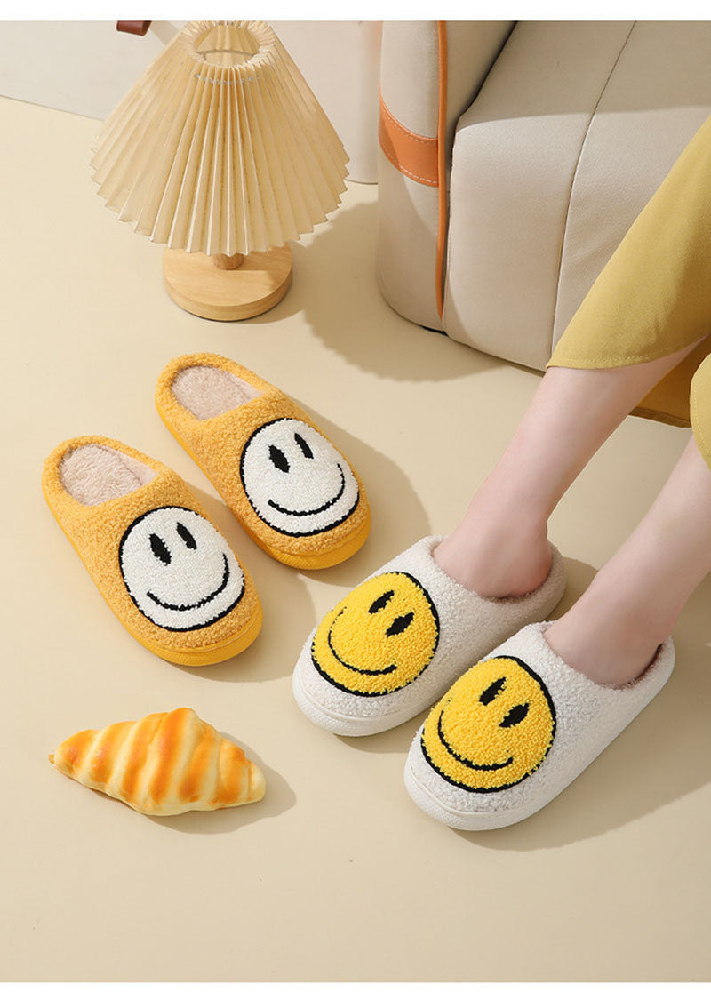Mirla | Stort smiley-mönster pälslofflor-Eva Jonsson