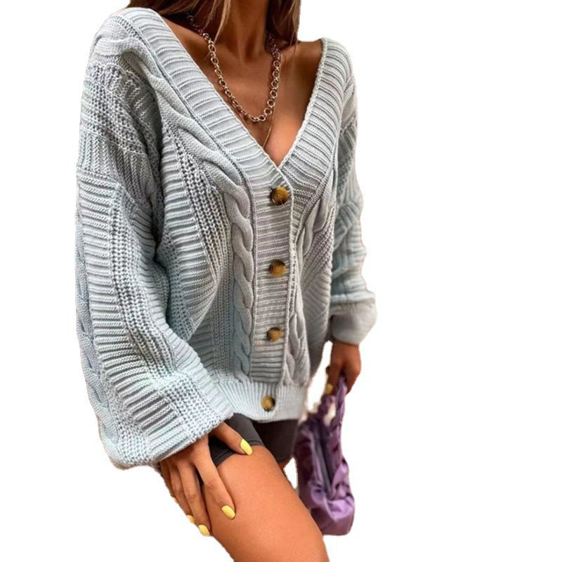 Färgstark chunky stickad cardigan för damer med stora knappar och voluminösa ärmar Mirla-Eva Jonsson