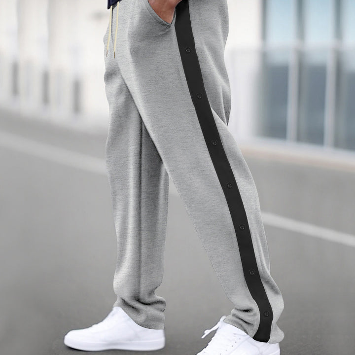 Herr Sportig Joggingbyxa med tryckknappsstängning och andningsbart material Mirla-Eva Jonsson