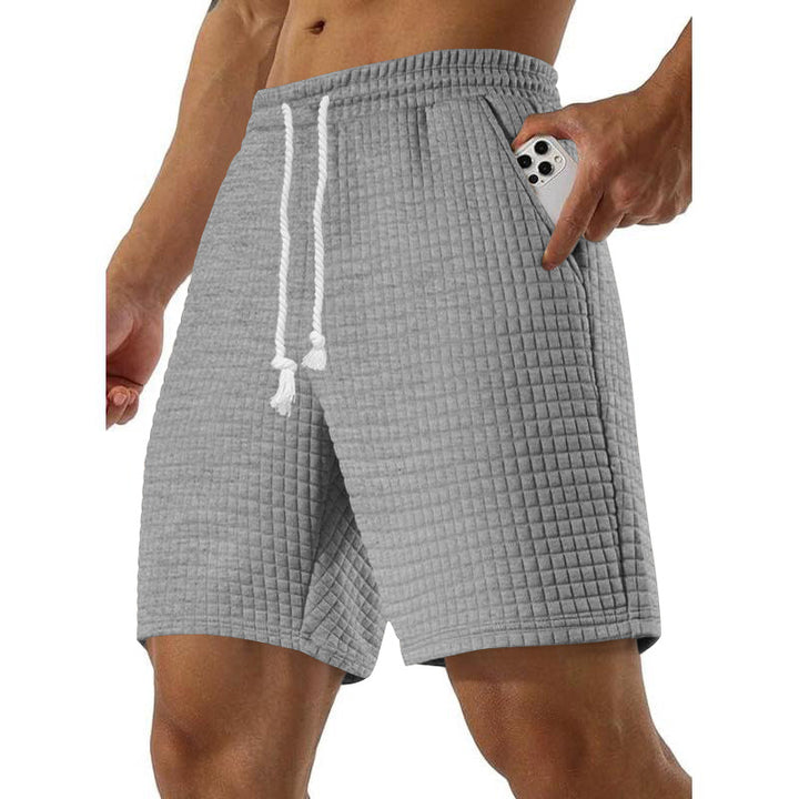Herr Sportiga fritidsshorts i andningsbart material med praktiska sidofickor Mirla-Eva Jonsson