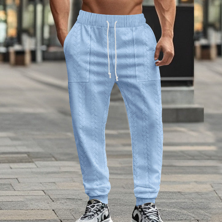 Herr Sportiga joggingsbyxor med strukturerad design och elastisk midja Eva Jonsson-Eva Jonsson