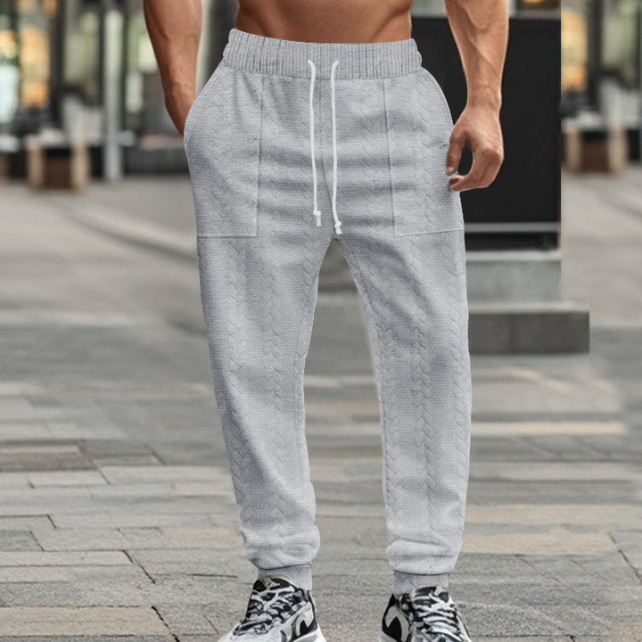 Herr Sportiga joggingsbyxor med strukturerad design och elastisk midja Eva Jonsson-Eva Jonsson