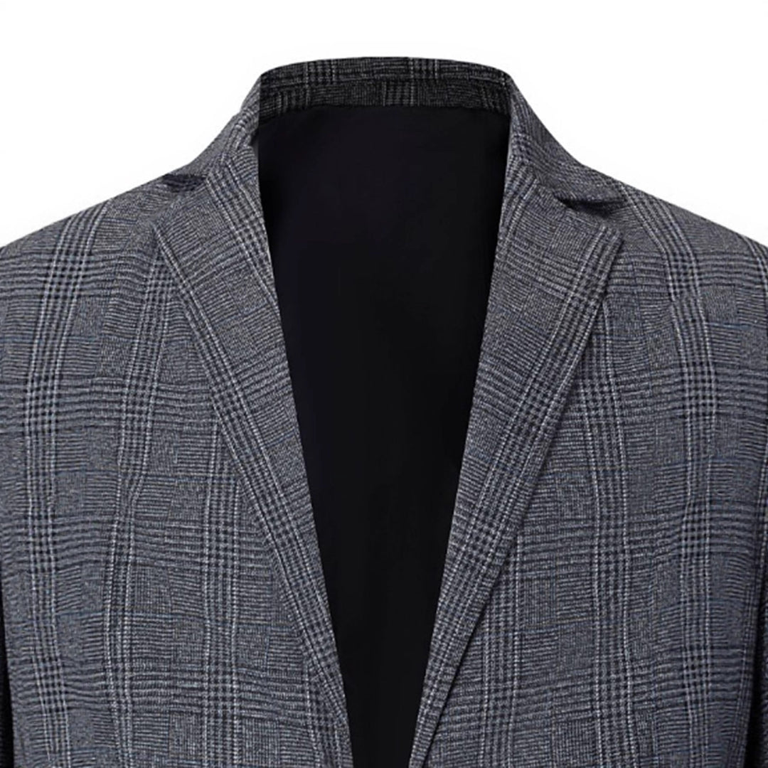 Herr elegant blazer med modernt rutmönster och praktiska fickor Mirla-Eva Jonsson