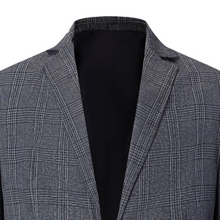 Herr elegant blazer med modernt rutmönster och praktiska fickor Mirla-Eva Jonsson
