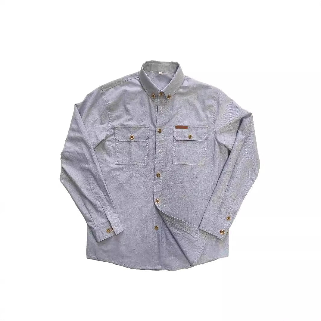 Herr långärmad skjorta med robusta bröstfickor och klassisk button-down-krage Mirla-Eva Jonsson