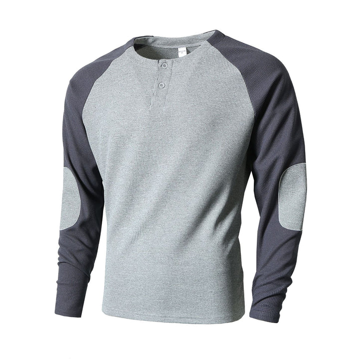Herr långärmad tröja med fashionabel Henley-utsnitt och strukturerade ärmar Mirla-Eva Jonsson