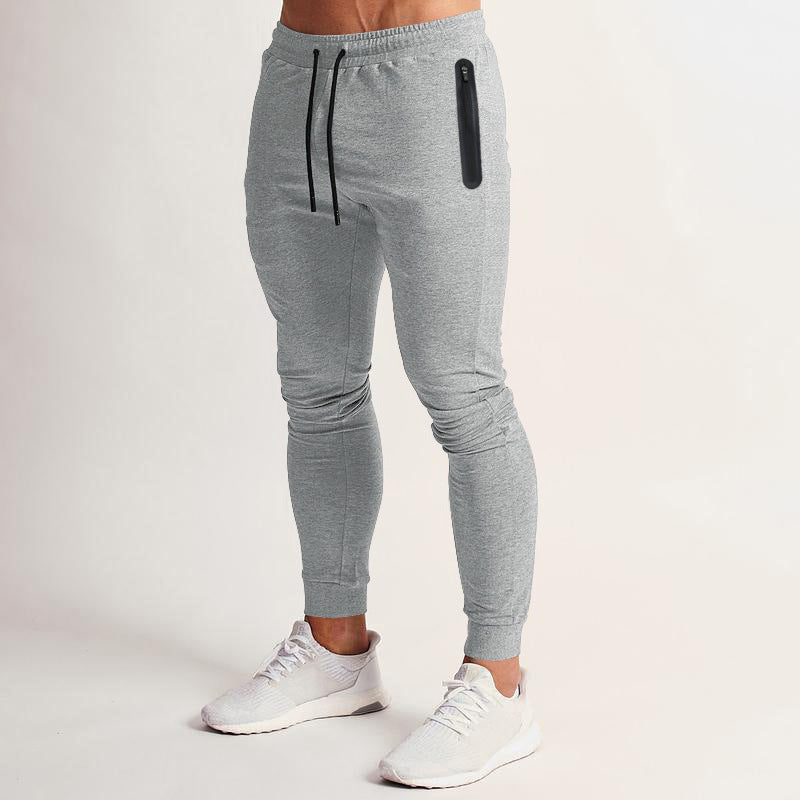 Herr sportig fitnessbyxor med ventilerande insatser och praktiska dragkedjefickor Eva Jonsson-Eva Jonsson