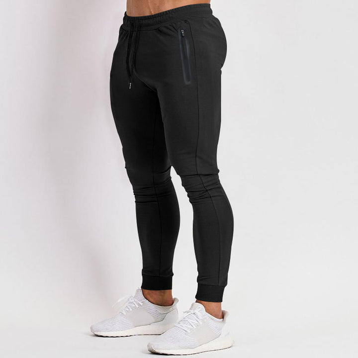 Herr sportig fitnessbyxor med ventilerande insatser och praktiska dragkedjefickor Eva Jonsson-Eva Jonsson