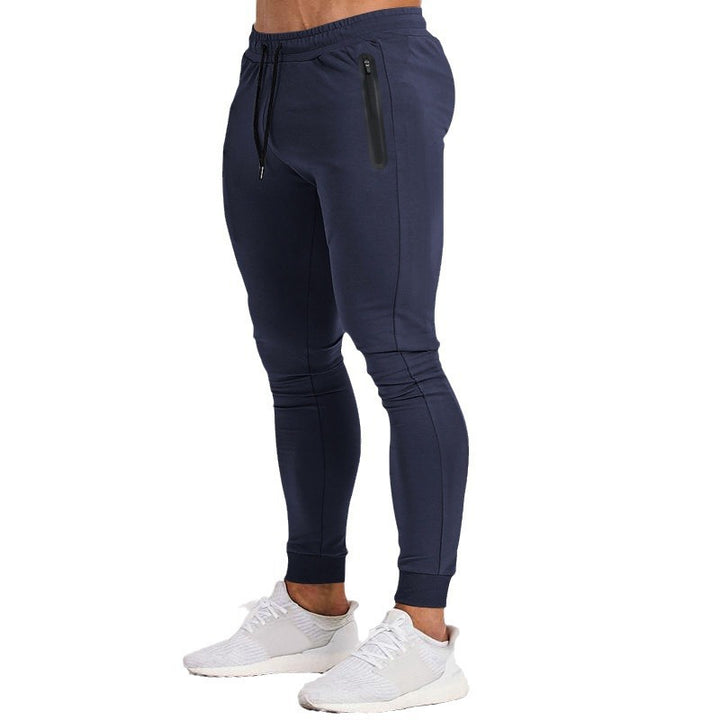 Herr sportig fitnessbyxor med ventilerande insatser och praktiska dragkedjefickor Eva Jonsson-Eva Jonsson