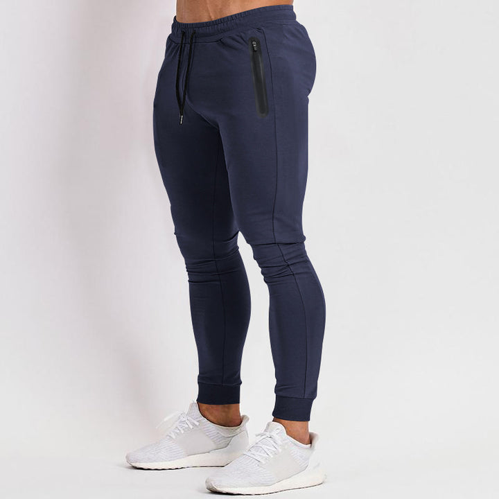 Herr sportig fitnessbyxor med ventilerande insatser och praktiska dragkedjefickor Eva Jonsson-Eva Jonsson