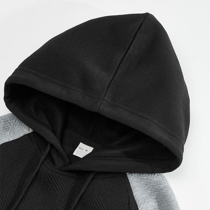 Herr sportig hoodie med strukturerad design och kontrastärmar Eva Jonsson-Eva Jonsson