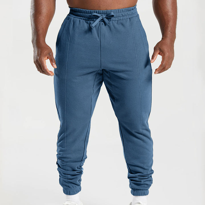 Herr sportig joggingbyxor med elastisk midja och sidofickor Mirla-Eva Jonsson