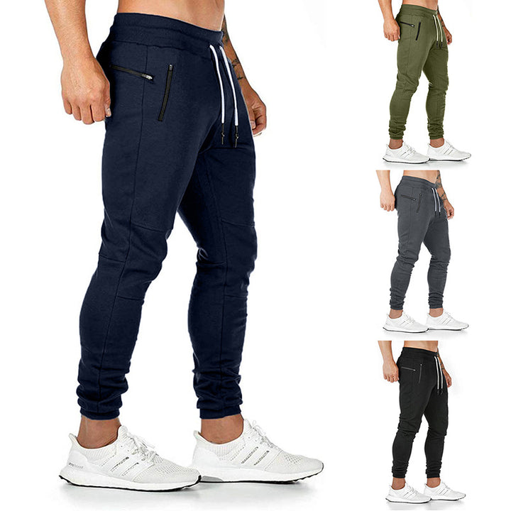 Herr sportig joggingbyxor med praktiska dragkedjefickor och elastiskt midjeband Mirla-Eva Jonsson