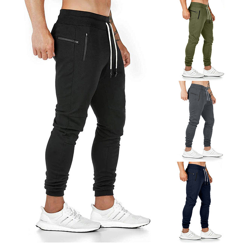 Herr sportig joggingbyxor med praktiska dragkedjefickor och elastiskt midjeband Mirla-Eva Jonsson