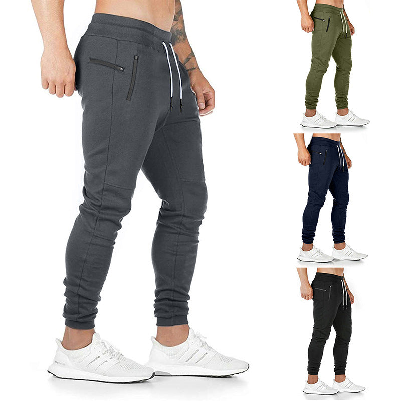 Herr sportig joggingbyxor med praktiska dragkedjefickor och elastiskt midjeband Mirla-Eva Jonsson
