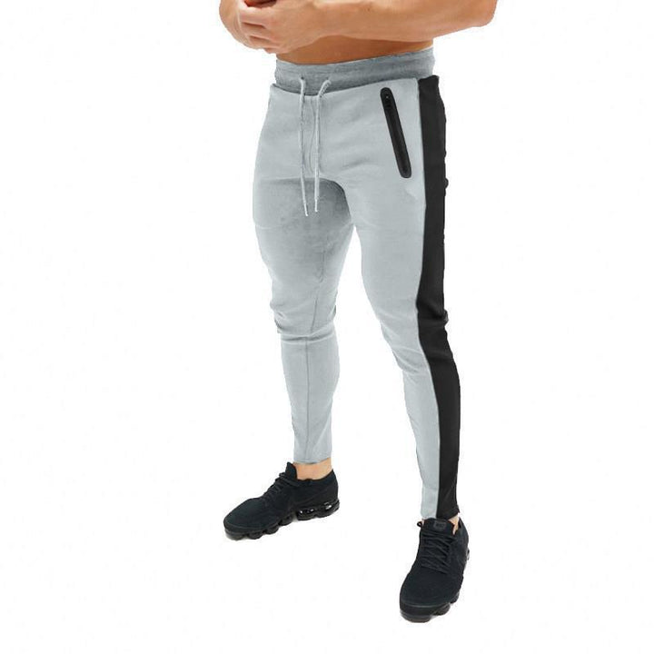 Herr sportig joggingsbyxor med sidofickor med dragkedja Mirla-Eva Jonsson