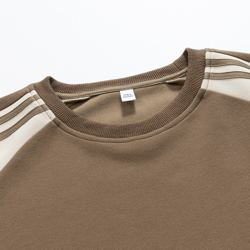 Herr sportig raglan-sweater med flerfärgade accenter Mirla-Eva Jonsson