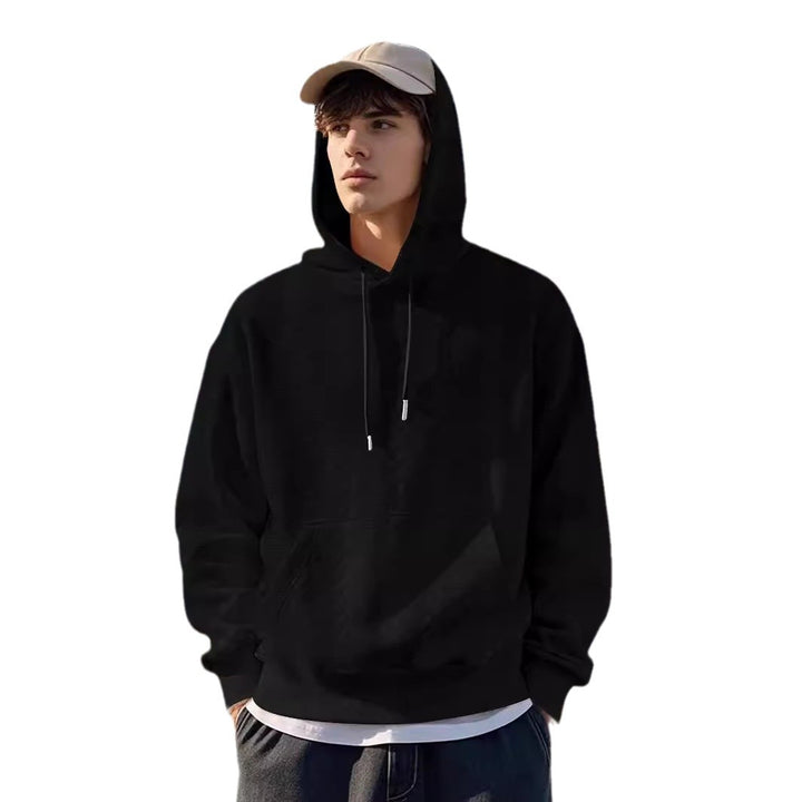 Herrar Hoodie med strukturerad design och kängurufickor Mirla-Eva Jonsson