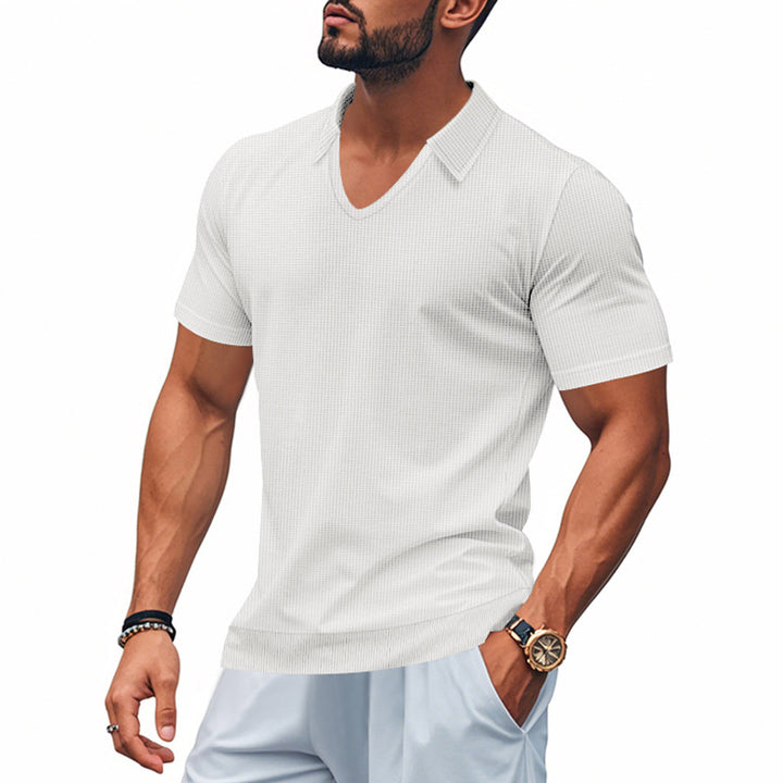 Herrar Polo-Shirt med strukturerad design och modern snitt Mirla-Eva Jonsson