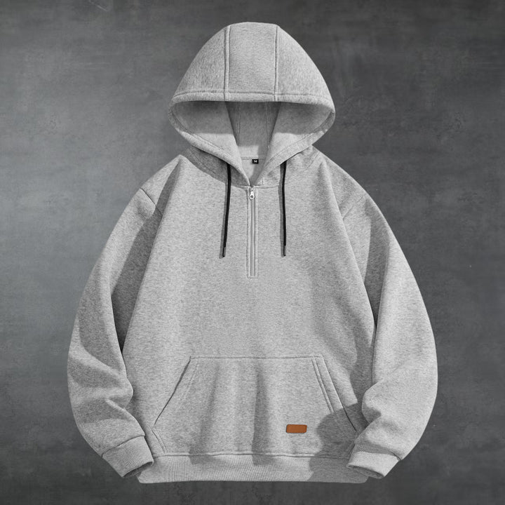 Herrar Sportig Hoodie med halvvisslad dragkedja och praktisk känguruficka Mirla-Eva Jonsson