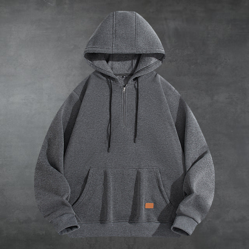 Herrar Sportig Hoodie med halvvisslad dragkedja och praktisk känguruficka Mirla-Eva Jonsson