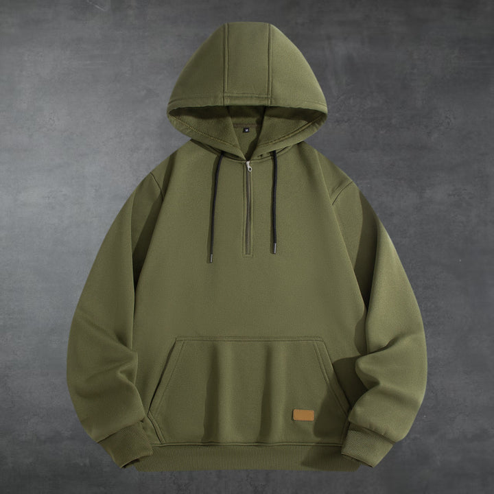 Herrar Sportig Hoodie med halvvisslad dragkedja och praktisk känguruficka Mirla-Eva Jonsson