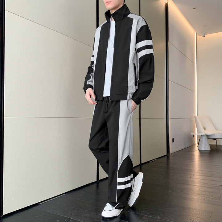 Herrar Sportig träningsoverall med andningsbara egenskaper och funktionella sidofickor Mirla-Eva Jonsson