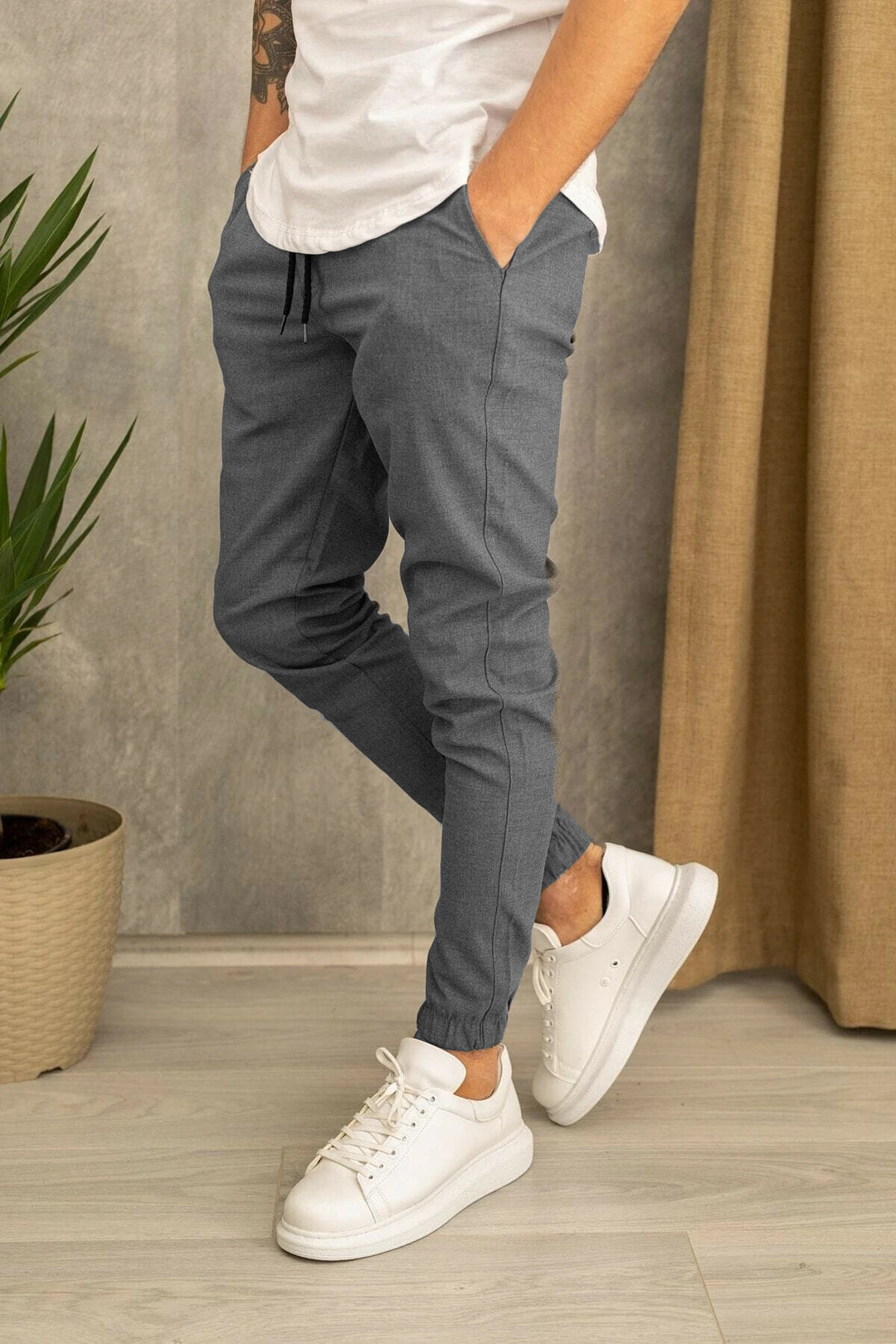 Herrar Sportiga fritidsbyxor med elastisk midja och sidofickor Mirla-Eva Jonsson