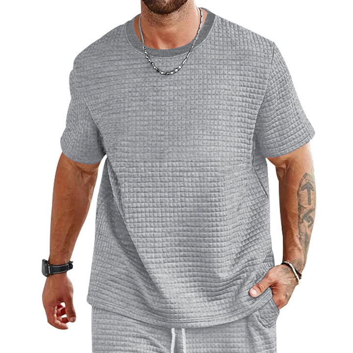 Herrar avslappnad T-shirt med strukturerad design Mirla-Eva Jonsson