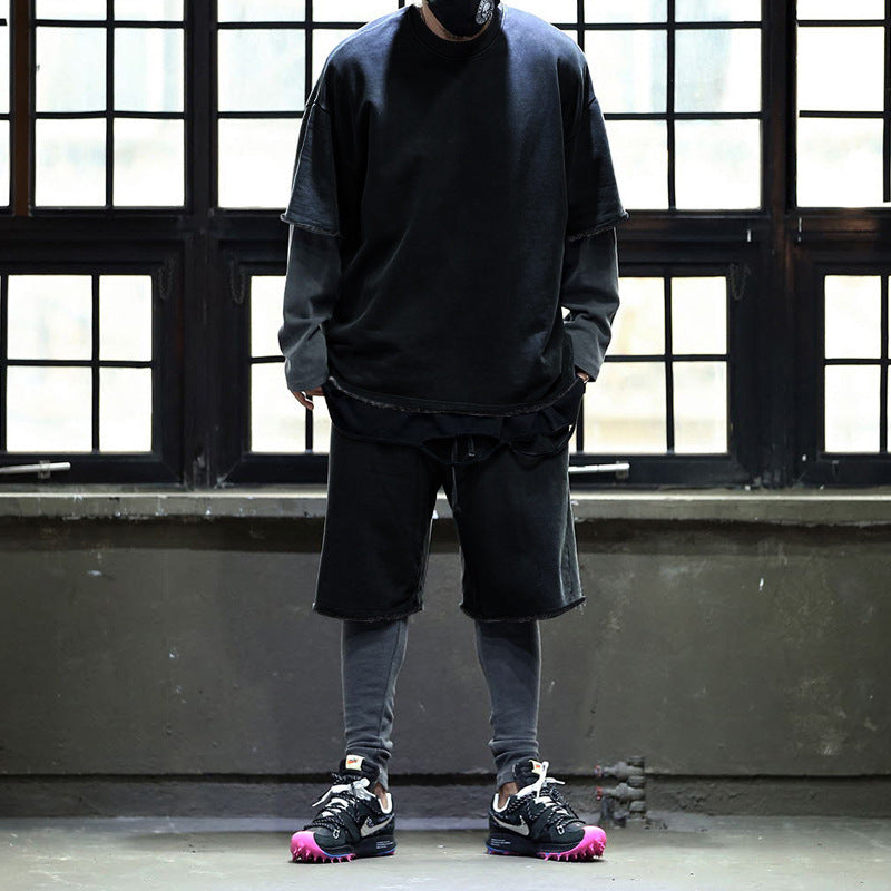 Herrar avslappnad premium fritidsset med oversized t-shirt och lösa shorts Mirla-Eva Jonsson