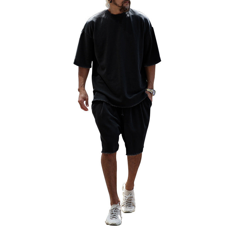 Herrar avslappnad premium fritidsset med oversized t-shirt och lösa shorts Mirla-Eva Jonsson