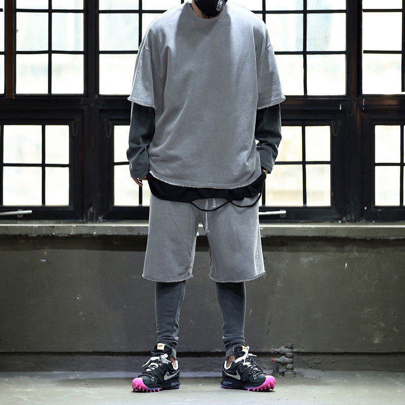 Herrar avslappnad premium fritidsset med oversized t-shirt och lösa shorts Mirla-Eva Jonsson