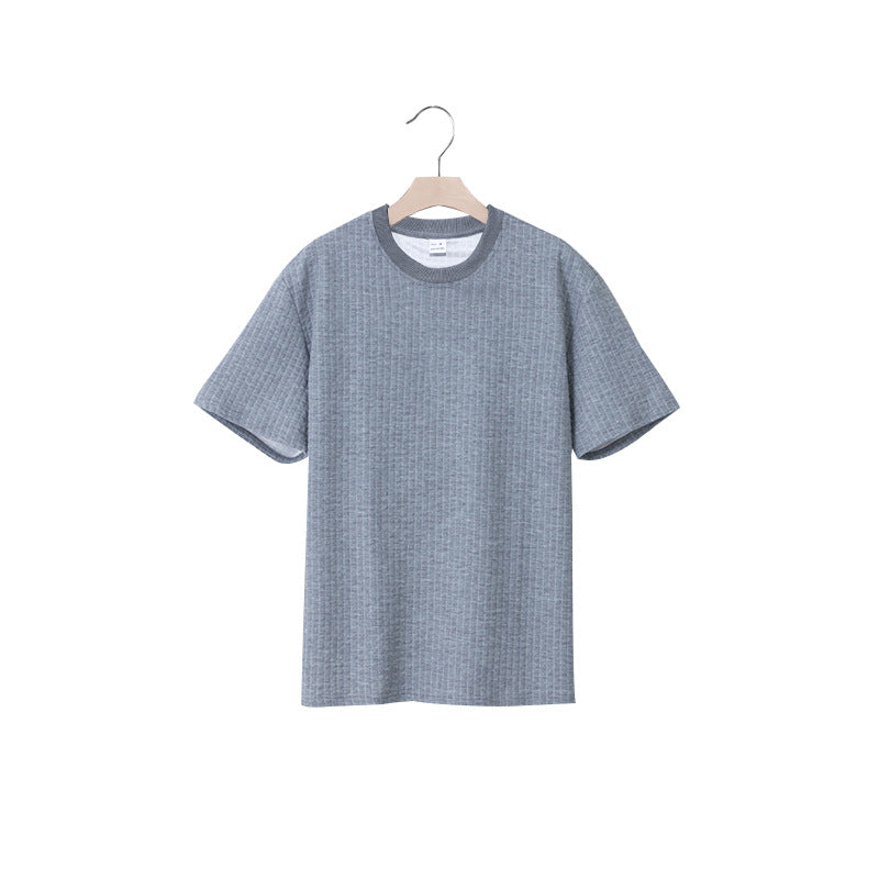 Herrar avslappnad rundhalsad T-shirt med strukturerad väv Mirla-Eva Jonsson