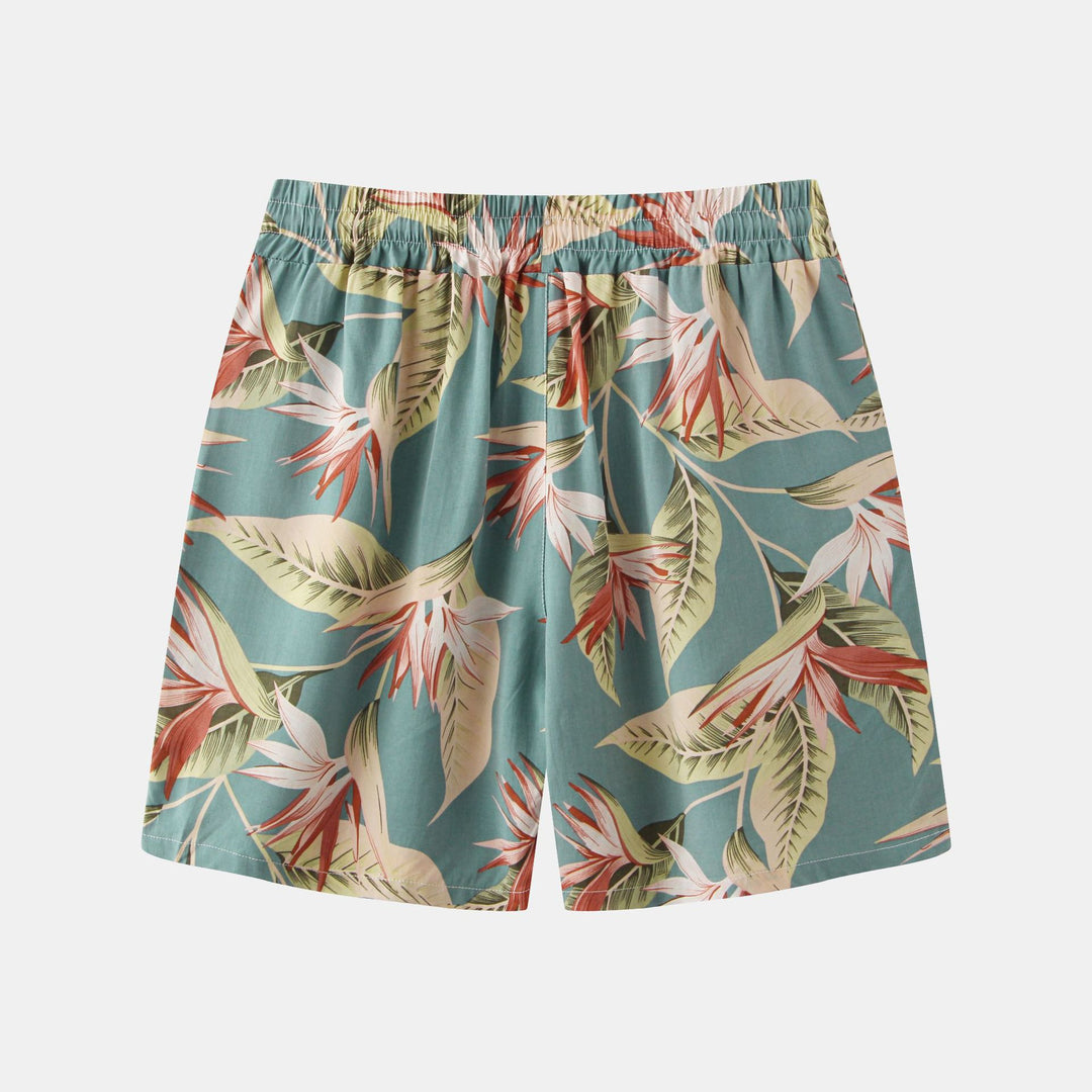 Herrar badshorts med tropiskt blad- och blommönster Mirla-Eva Jonsson