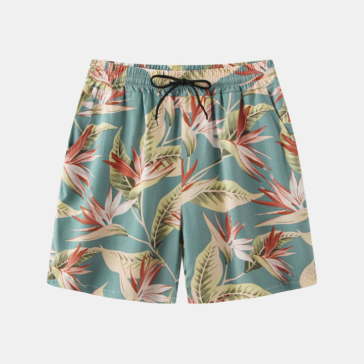 Herrar badshorts med tropiskt blad- och blommönster Mirla-Eva Jonsson