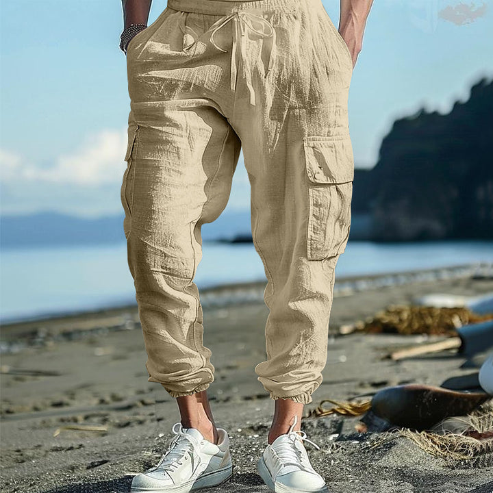 Herrar bekväm cargo-bukser i lätt linne material med elastisk midja och praktiska sidofickor Mirla-Eva Jonsson