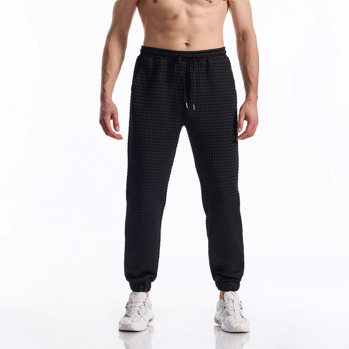 Herrar bekväm fritidsbyxa med strukturerad yta och elastisk midja Mirla-Eva Jonsson