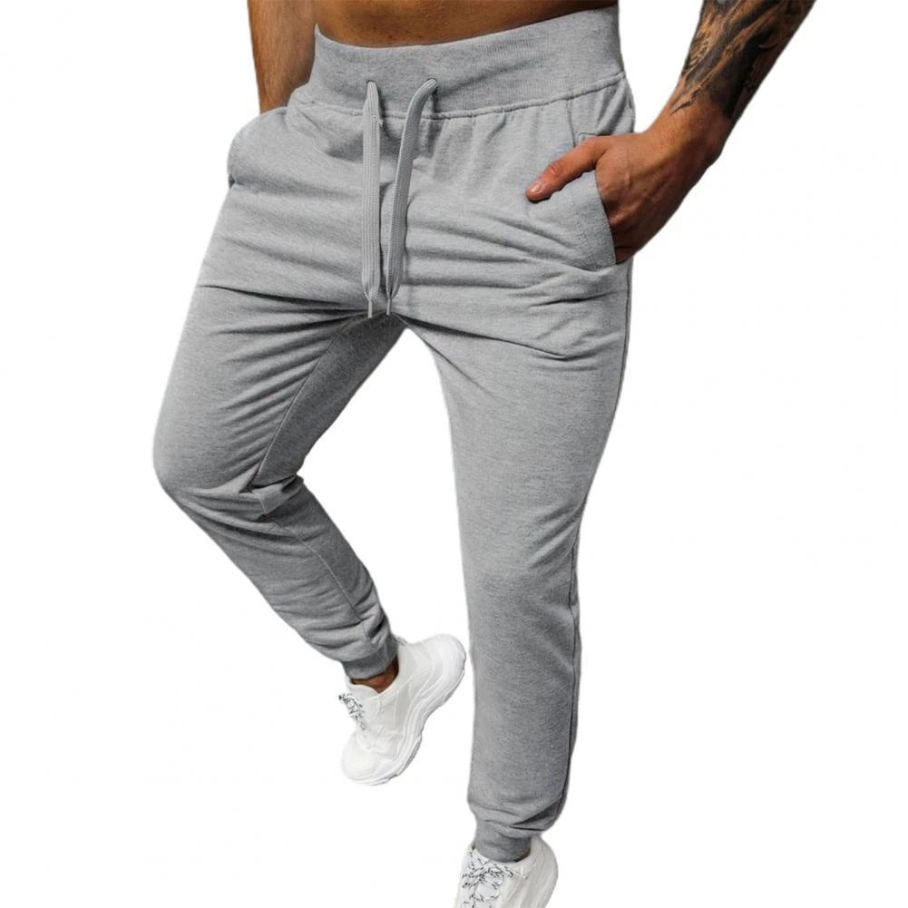 Herrar bekväma joggingsbyxor med sidofickor och elastisk midja Mirla-Eva Jonsson