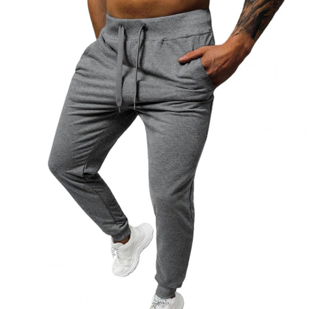 Herrar bekväma joggingsbyxor med sidofickor och elastisk midja Mirla-Eva Jonsson