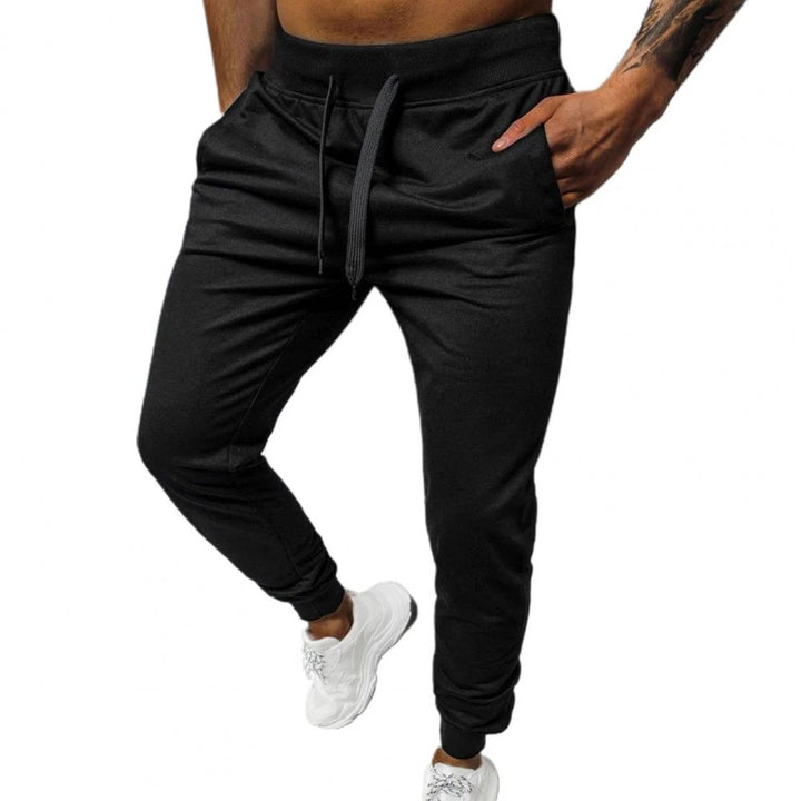Herrar bekväma joggingsbyxor med sidofickor och elastisk midja Mirla-Eva Jonsson
