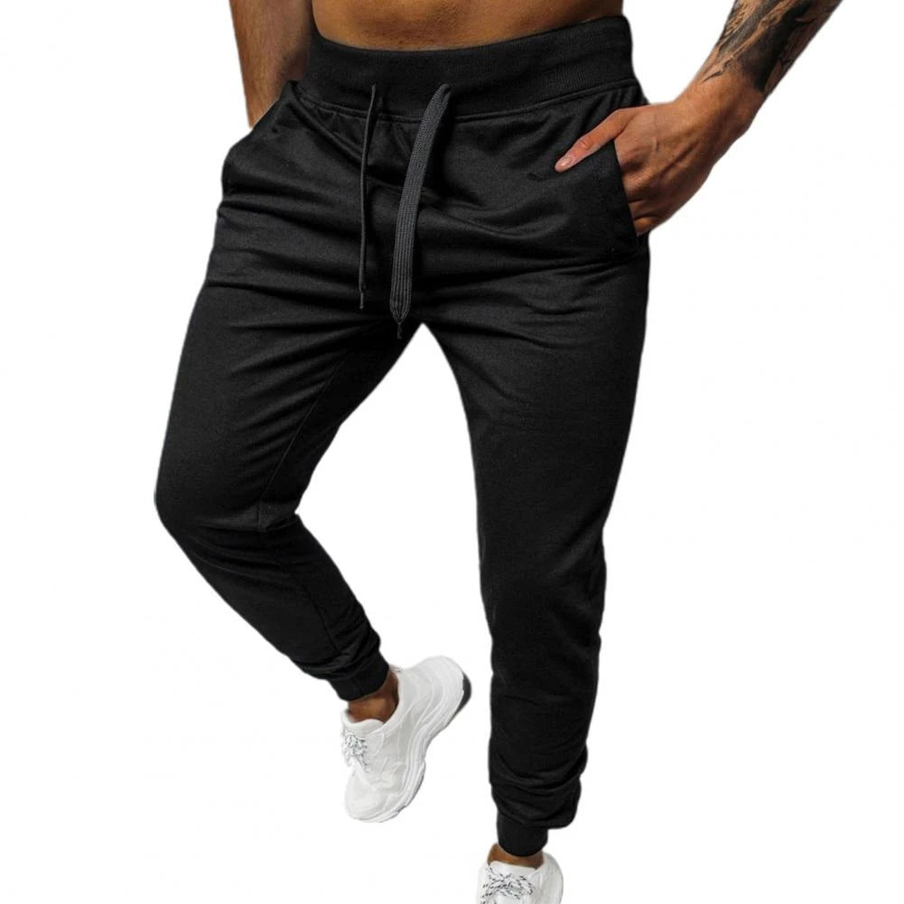 Herrar bekväma joggingsbyxor med sidofickor och elastisk midja Mirla-Eva Jonsson