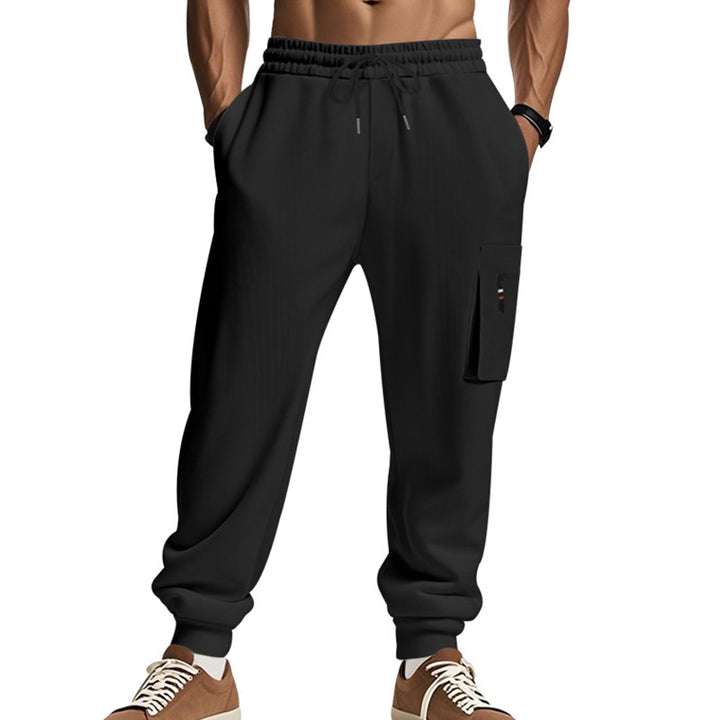 Herrar cargo-joggingbyxor med elastisk midja och rymliga sidofickor Mirla-Eva Jonsson
